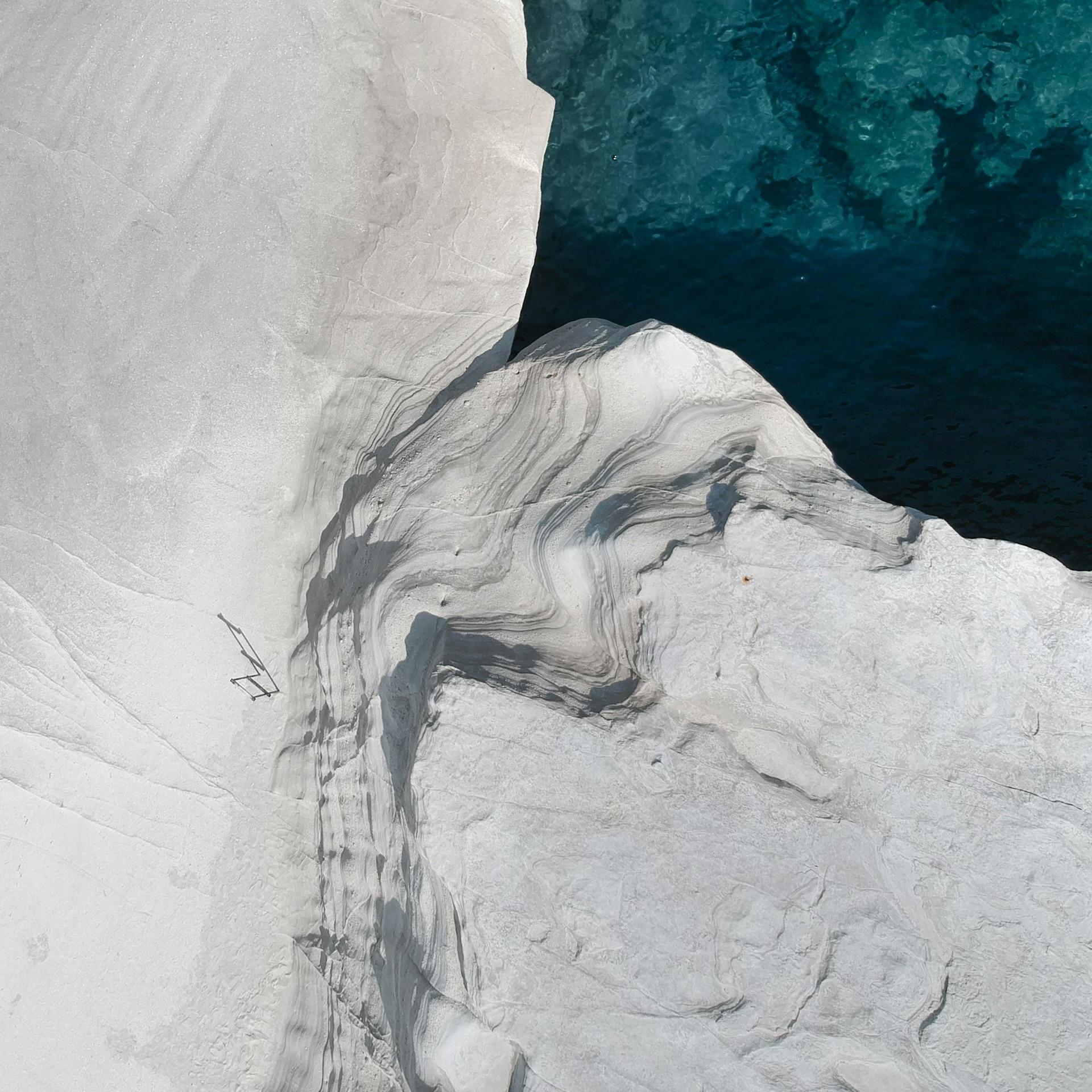 Milos, Sarakiniko, white rocks and turquoise sea