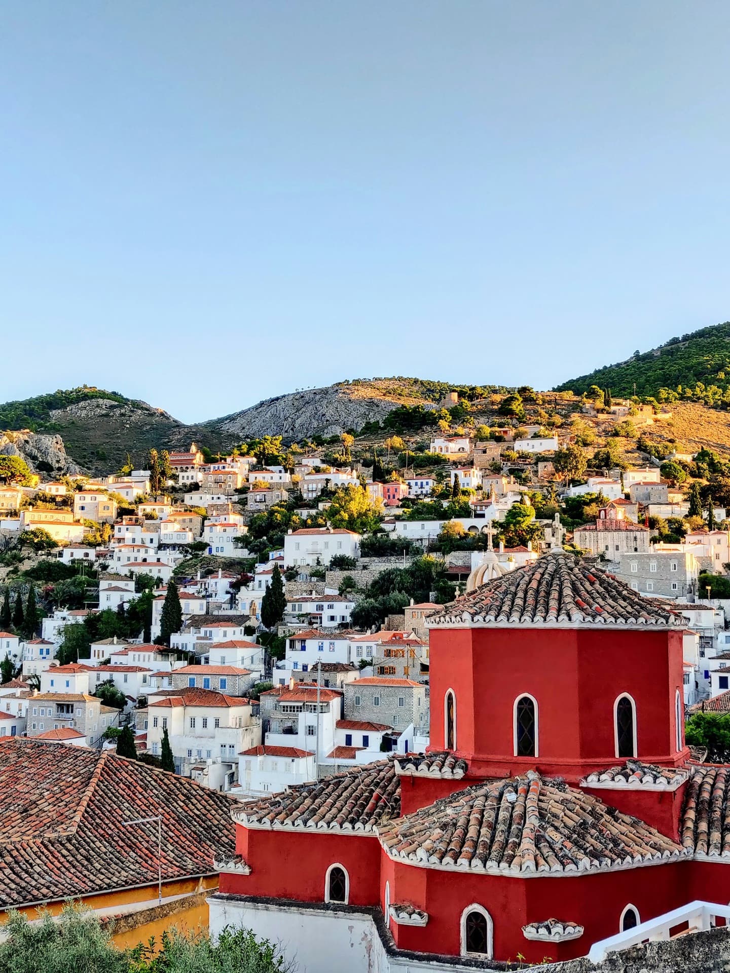 Hydra village and rooftops at golden hour
