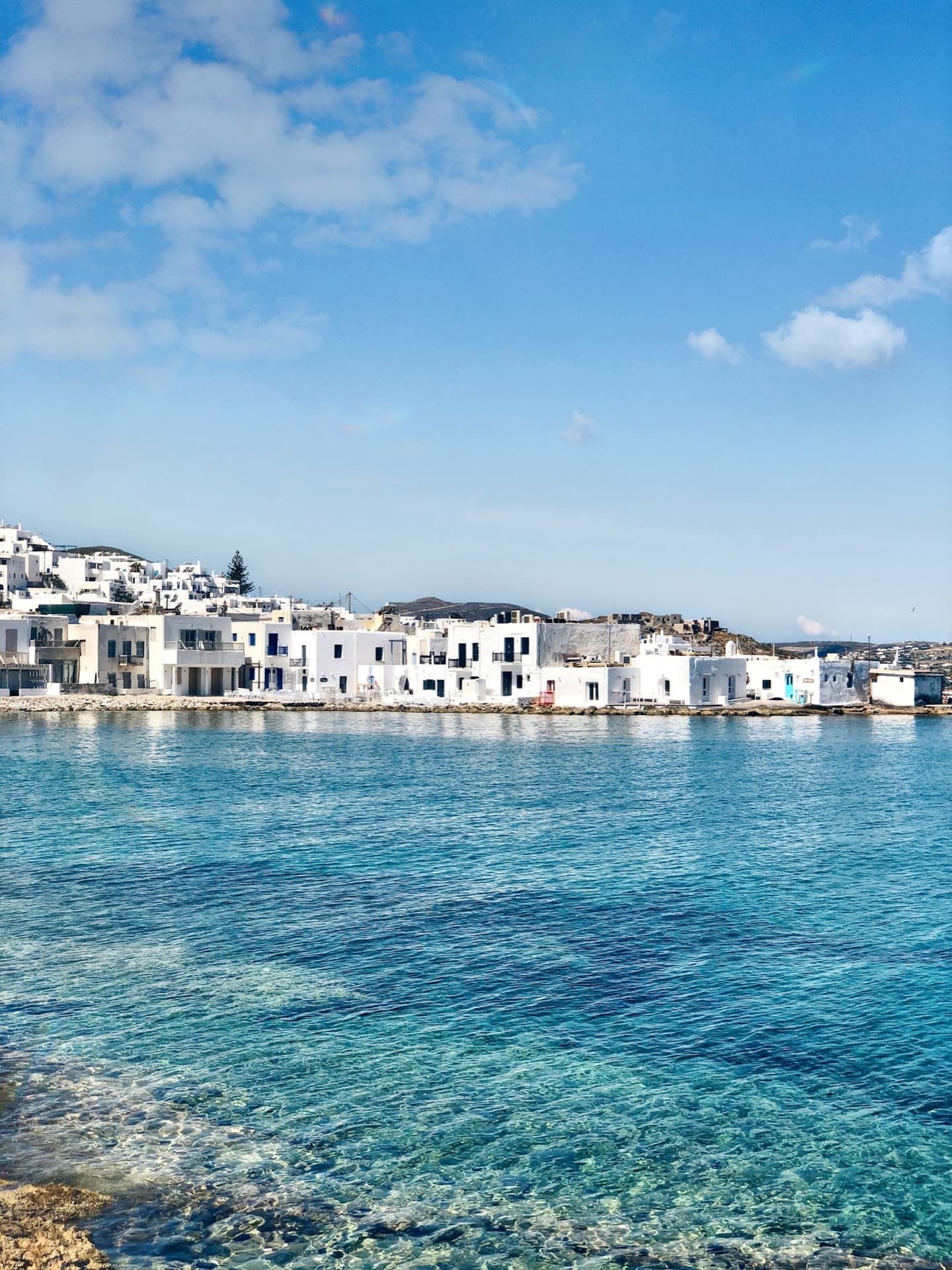 Paros south coast, quiet bays and fishing port at golden hour