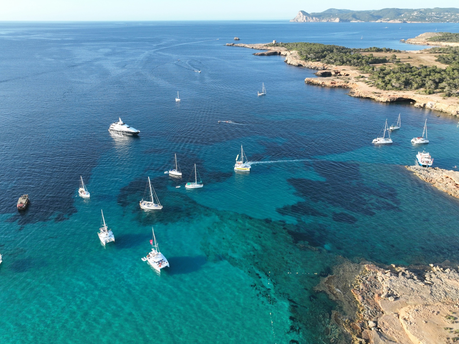 Aerial view boats turquoise water Greece