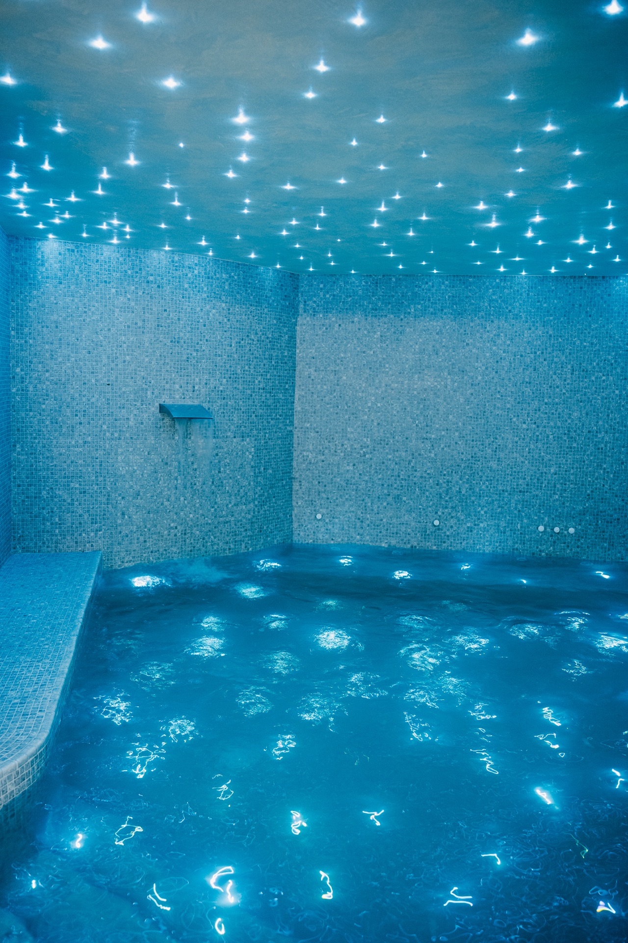 Hammam with star-lit mosaic ceiling and turquoise tiles