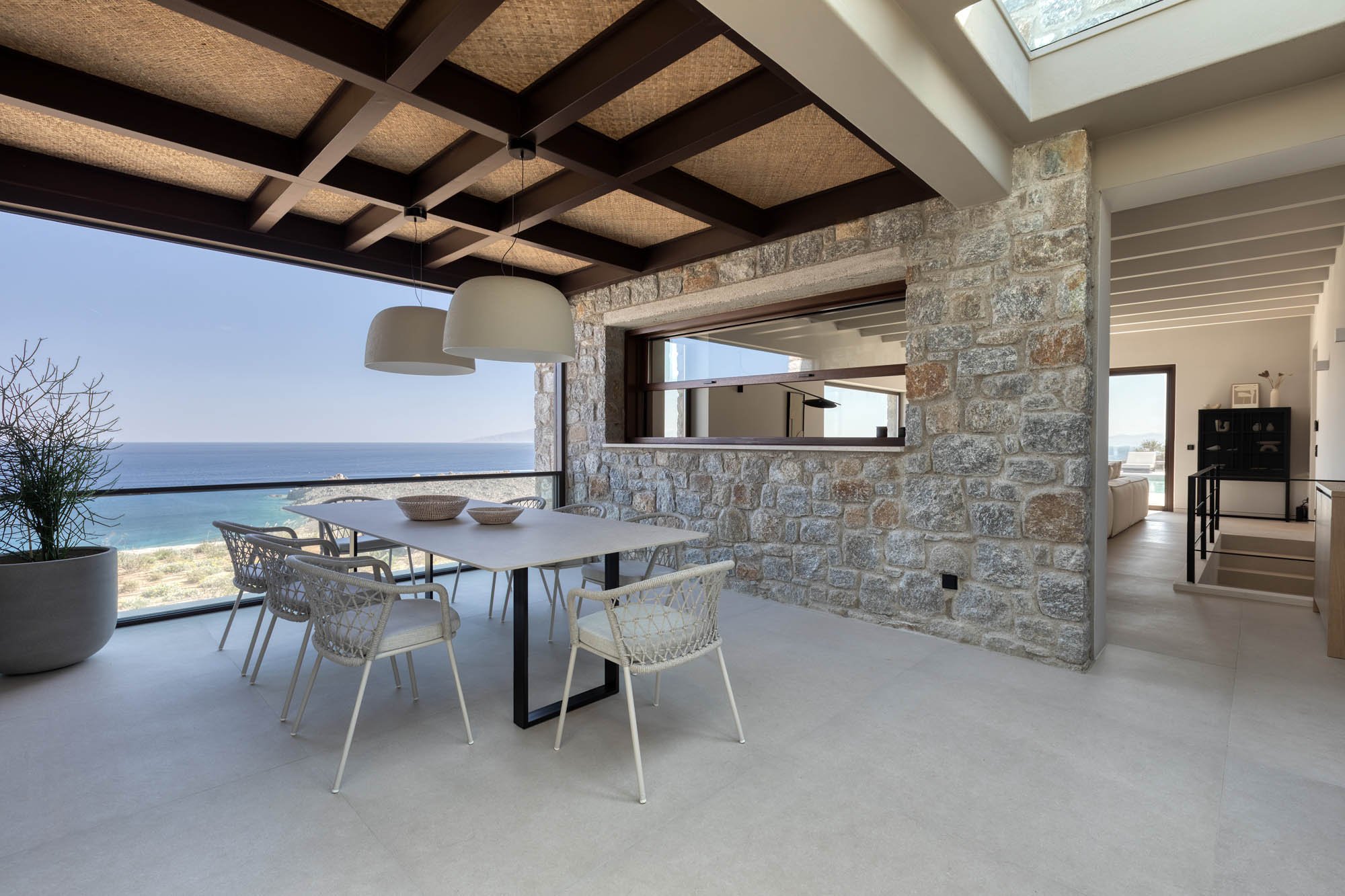 Outdoor pergola dining with sea view