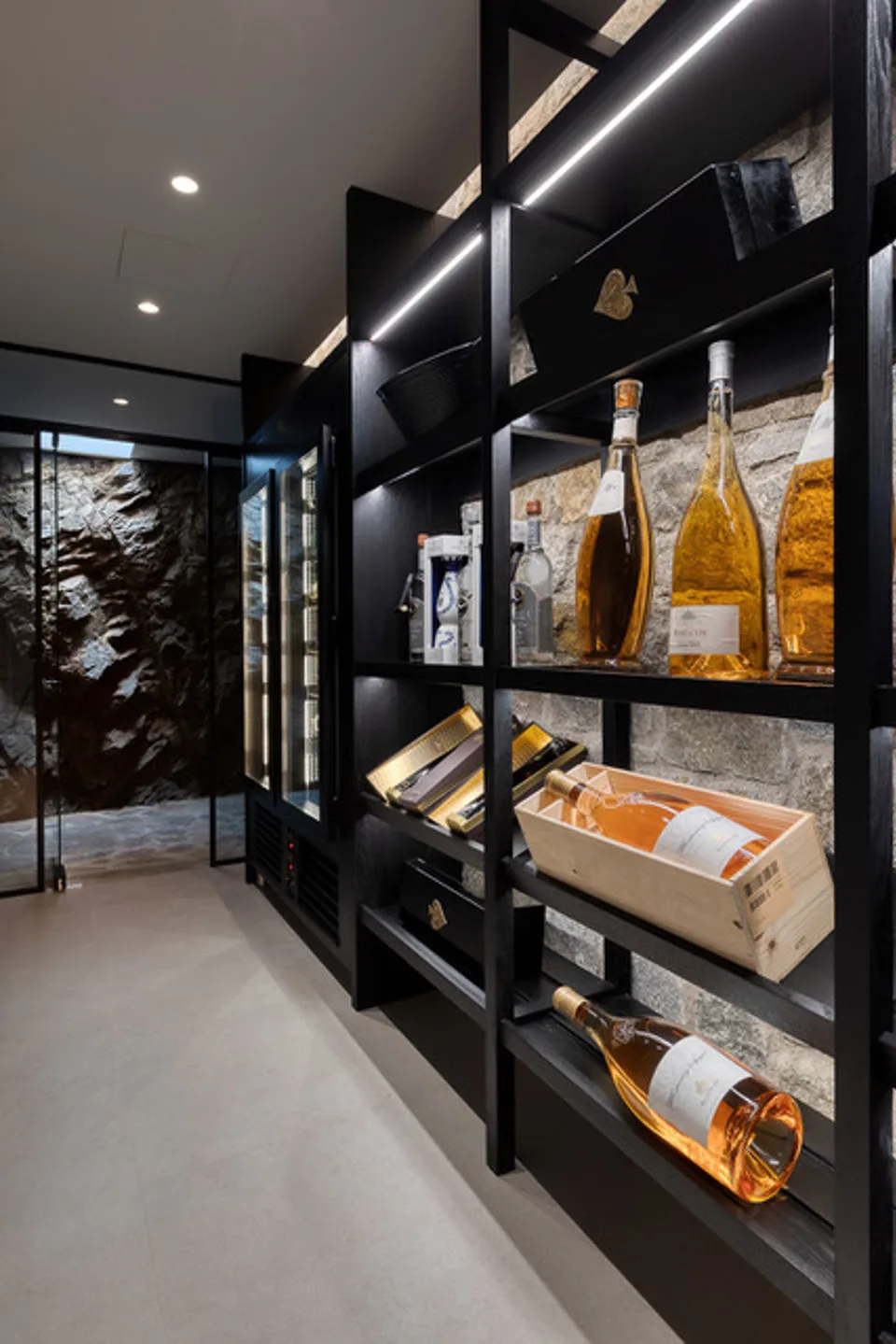 Private wine cellar in stone and dark wood