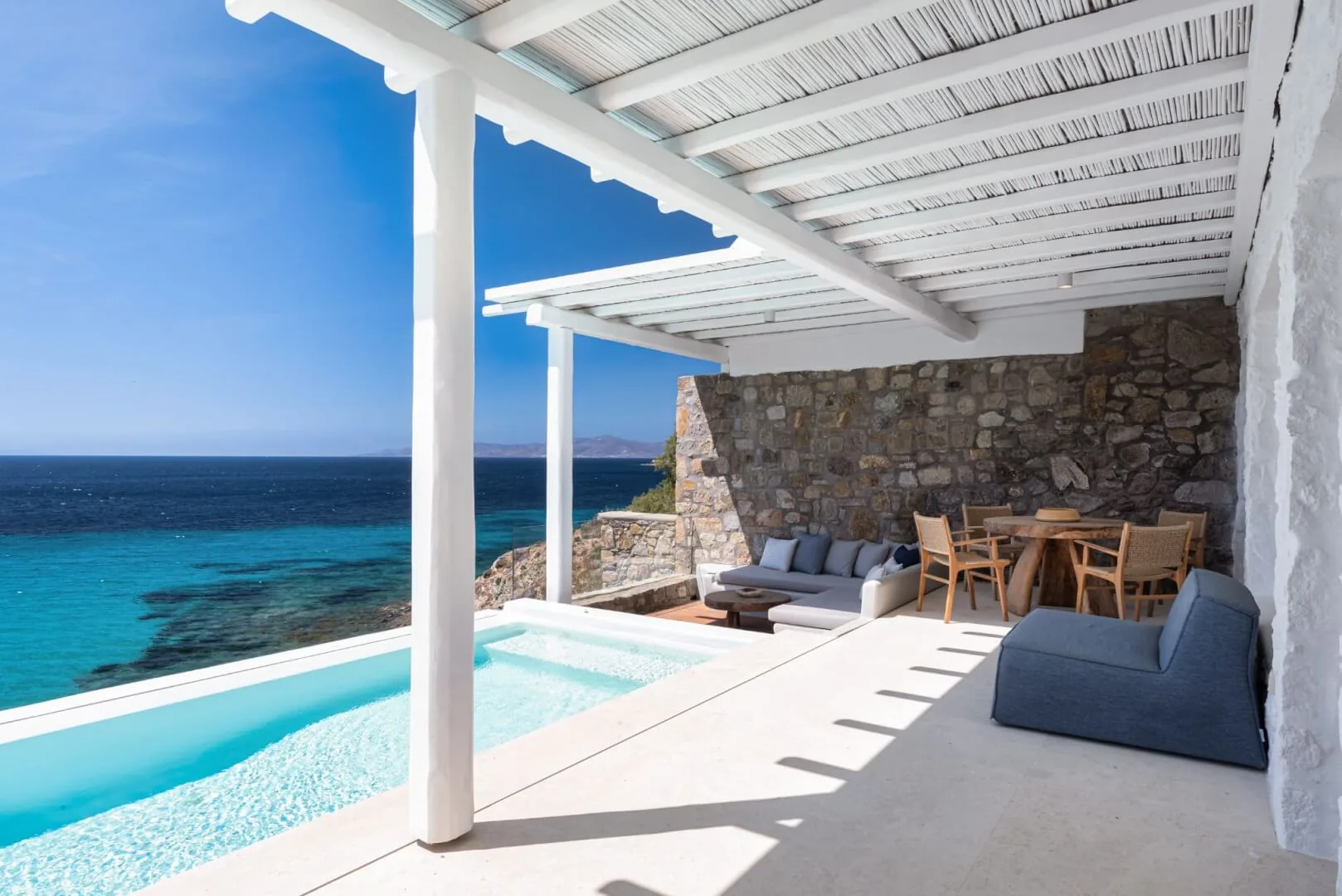 Private suite plunge pool, the sea opening beyond