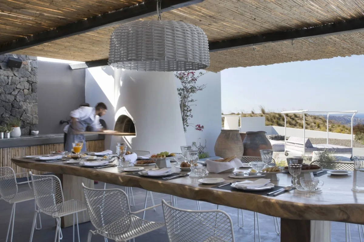 Outdoor kitchen and bamboo pergola, breakfast in preparation