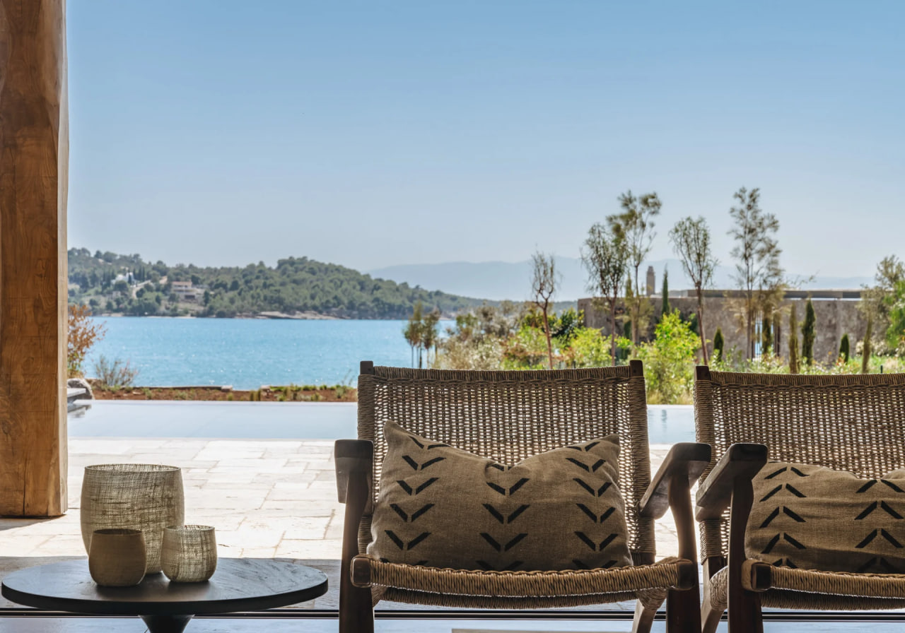 Terrace lounge looking out to the bay, the Peloponnese hills beyond